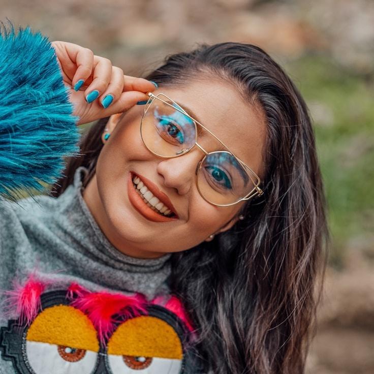 Kaveri Mehta, Lead Design Curator at Prime Core Studio, reviewing corporate floral arrangements